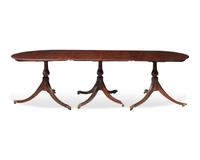 A George III three-part mahogany dining table, circa 1800