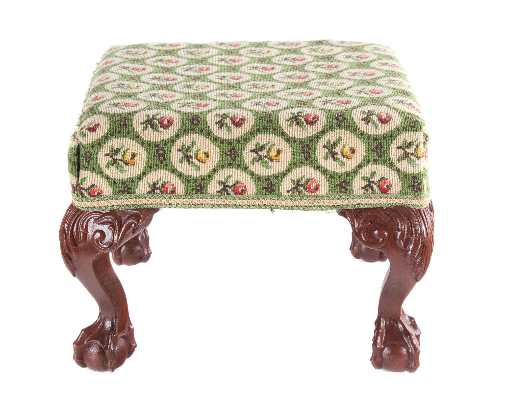 A Needlepoint Upholstered Footstool Height 12 x 15 inches square.