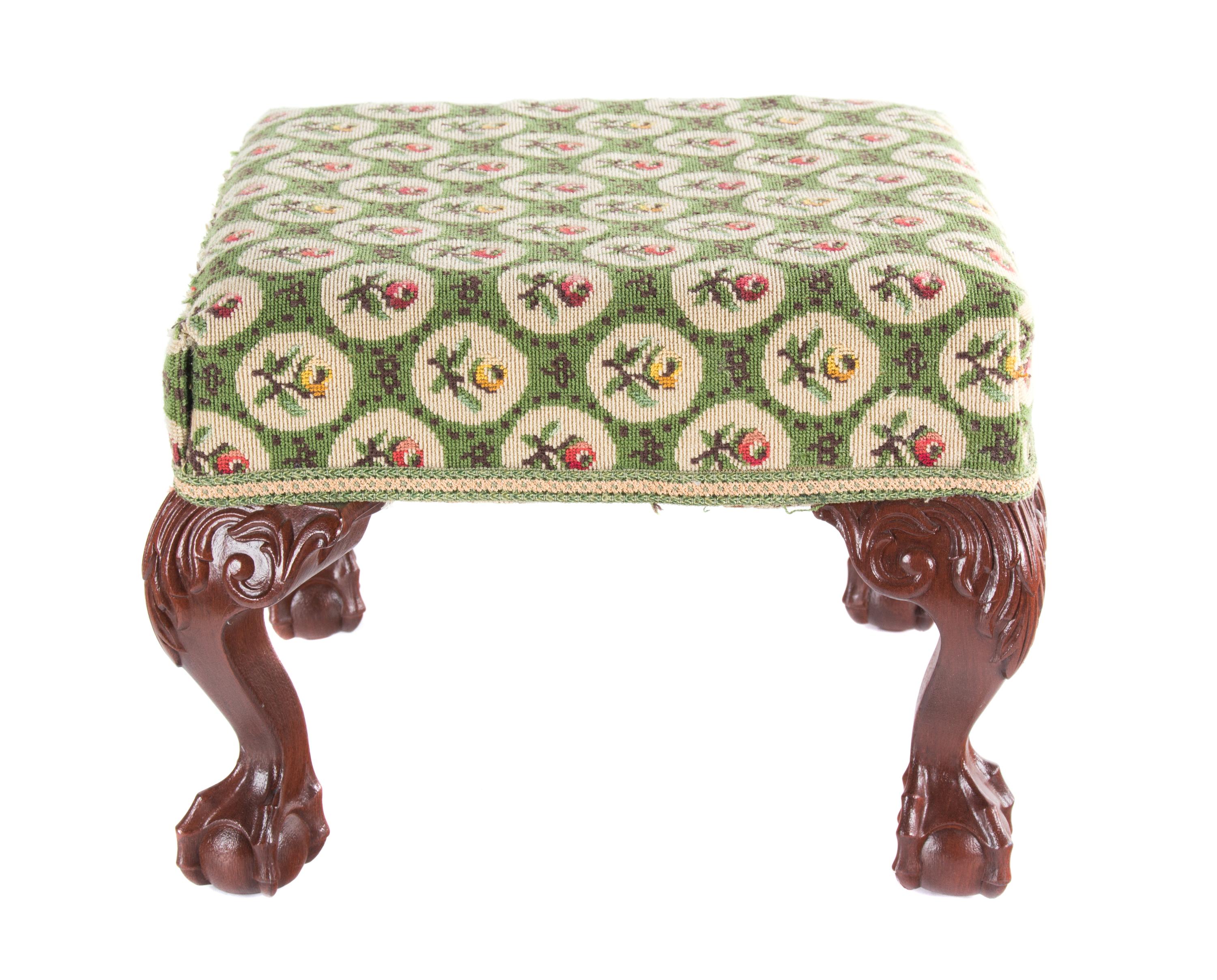 A Needlepoint Upholstered Footstool Height 12 x 15 inches square.