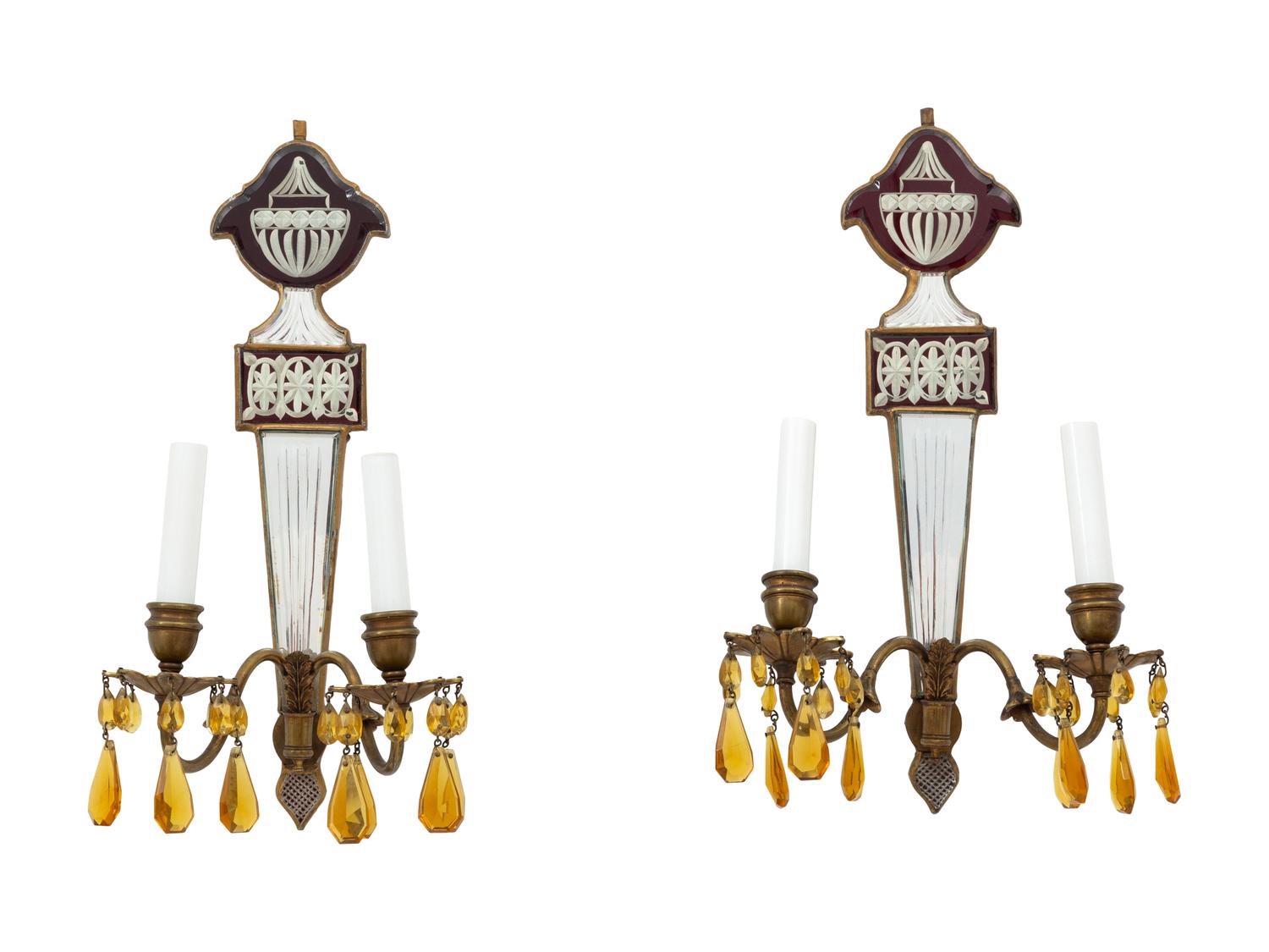 A Set of Four Regency Style Mirrored Two-Light Sconces