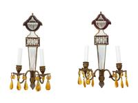 A Set of Four Regency Style Mirrored Two-Light Sconces
