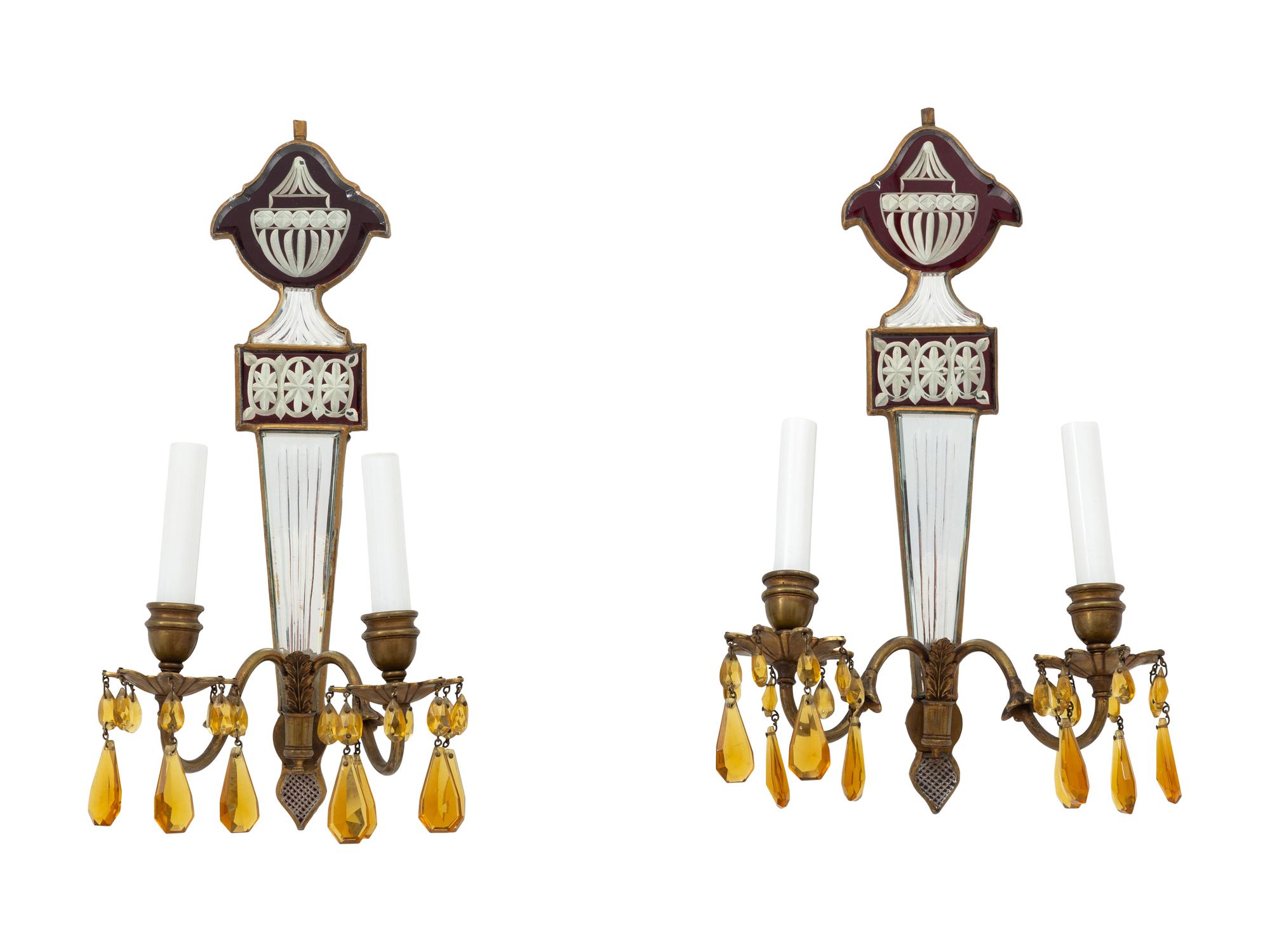 A Set of Four Regency Style Mirrored Two-Light Sconces