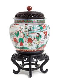 A Wucai Porcelain Jar Height 5 3/4 inches.