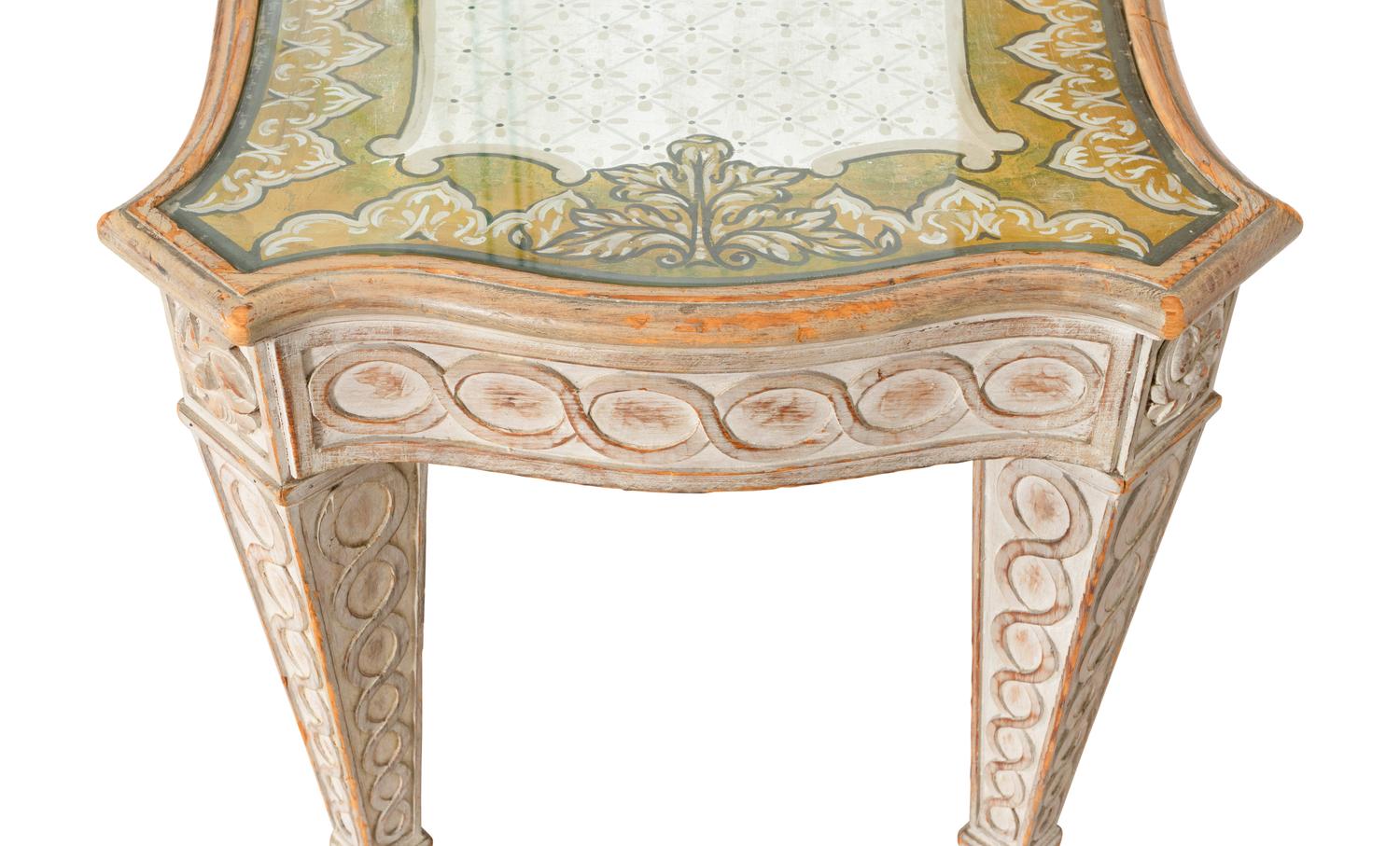 An Italian Cream-Painted and Parcel Gilt Cocktail Table
