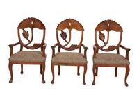 A Set of Five Carved Wood Lotus Flower Armchairs in the Manner of Phyllis Morris