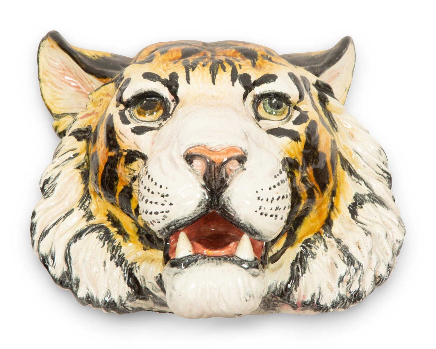 A Group of Six Italian Glazed Terracotta Feline Head Wall Mounts