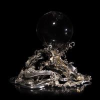 A Japanese Rock Crystal Sphere and Silver 'Dragon and Waves' Stand, Signed Yoshimasa Saku Meiji/Taisho Period 日本明治/大正時期 義正作潮を支配する珠と龍