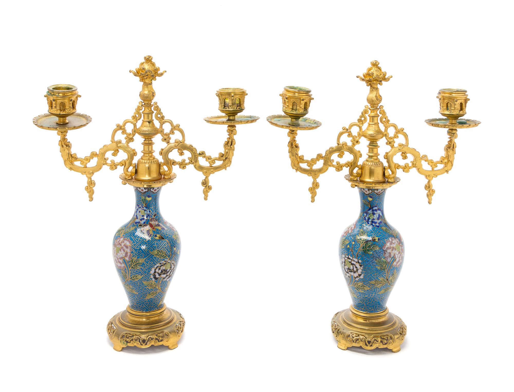 A Pair of French Gilt Bronze and Cloisonne Two-Light Candelabra Height 13 5/8 inches. — ATTRIBUTED TO EDOUARD LIEVRE, PARIS