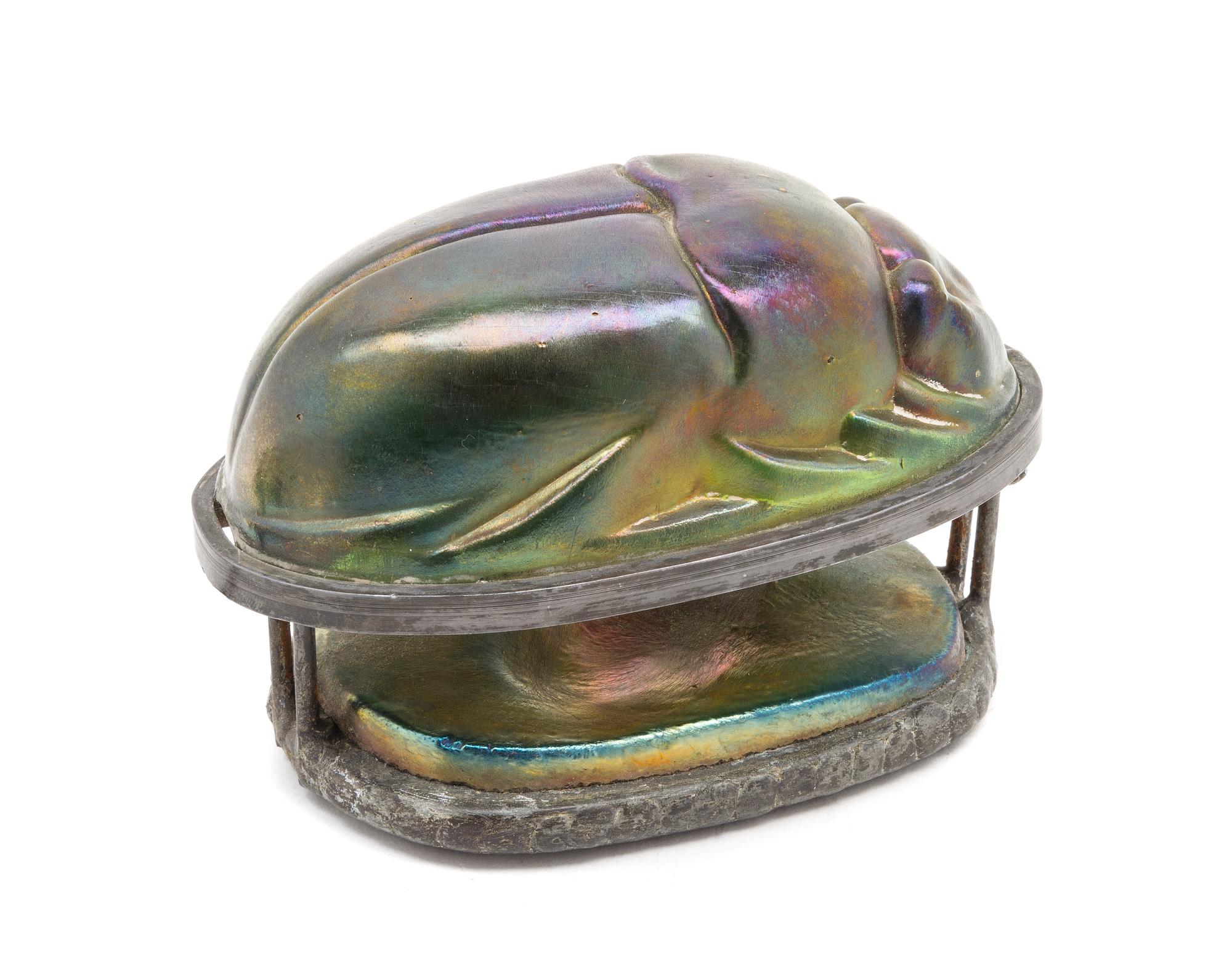 An Iridescent Glass and Cast Metal Scarab Lamp Width 5 3/8 inches.