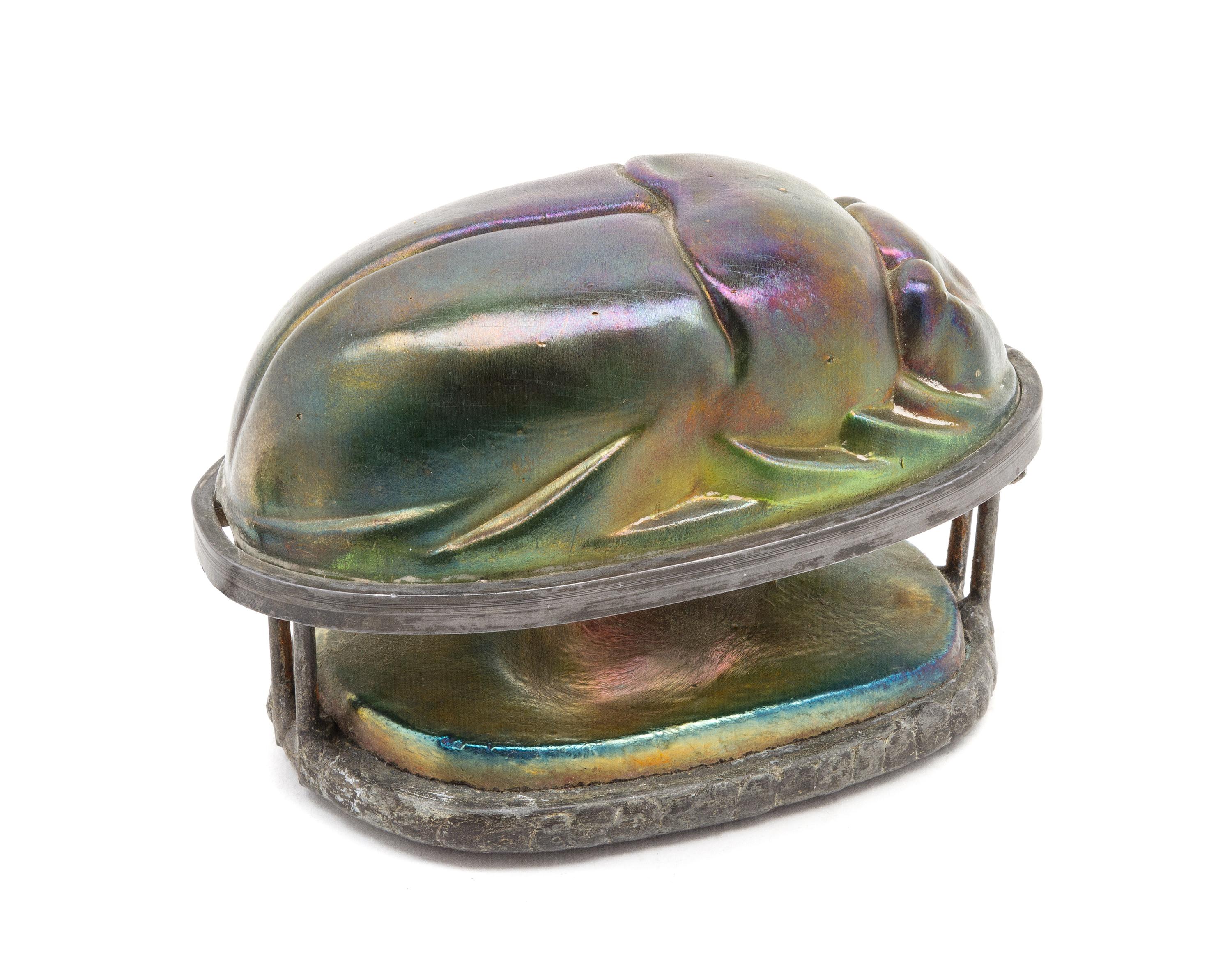 An Iridescent Glass and Cast Metal Scarab Lamp Width 5 3/8 inches.