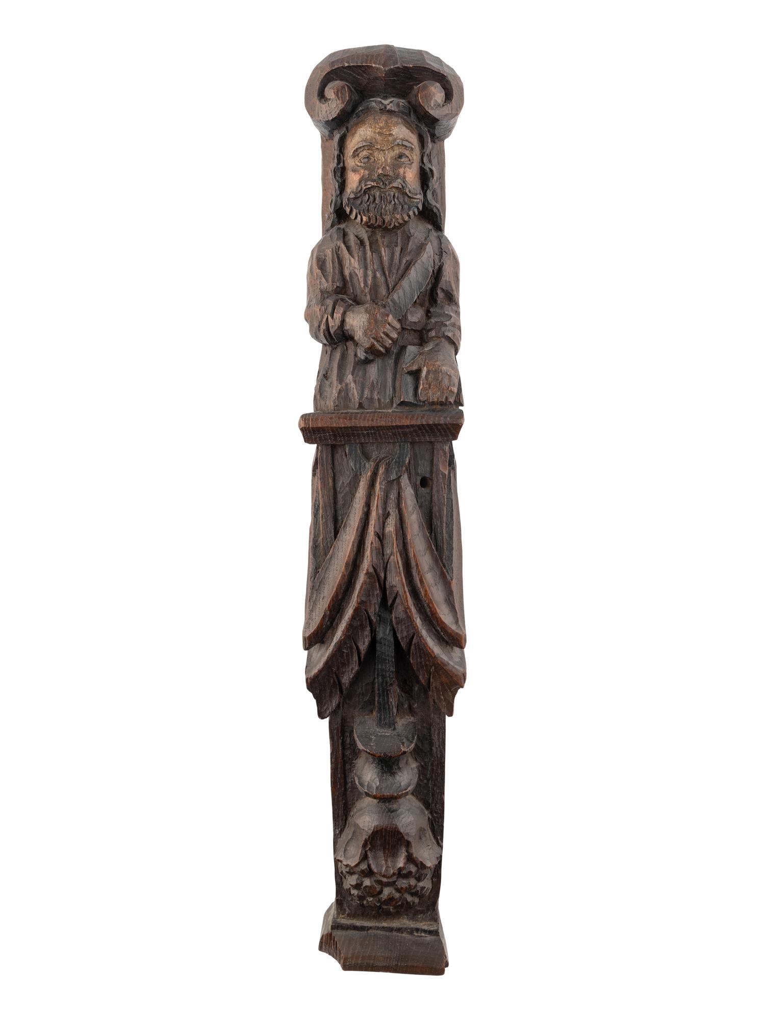 A Carved Oak and Polychrome Decorated Figural Pilaster