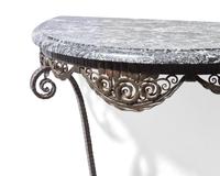A French Art Deco iron console table with Grand antique marble top, circa 1930