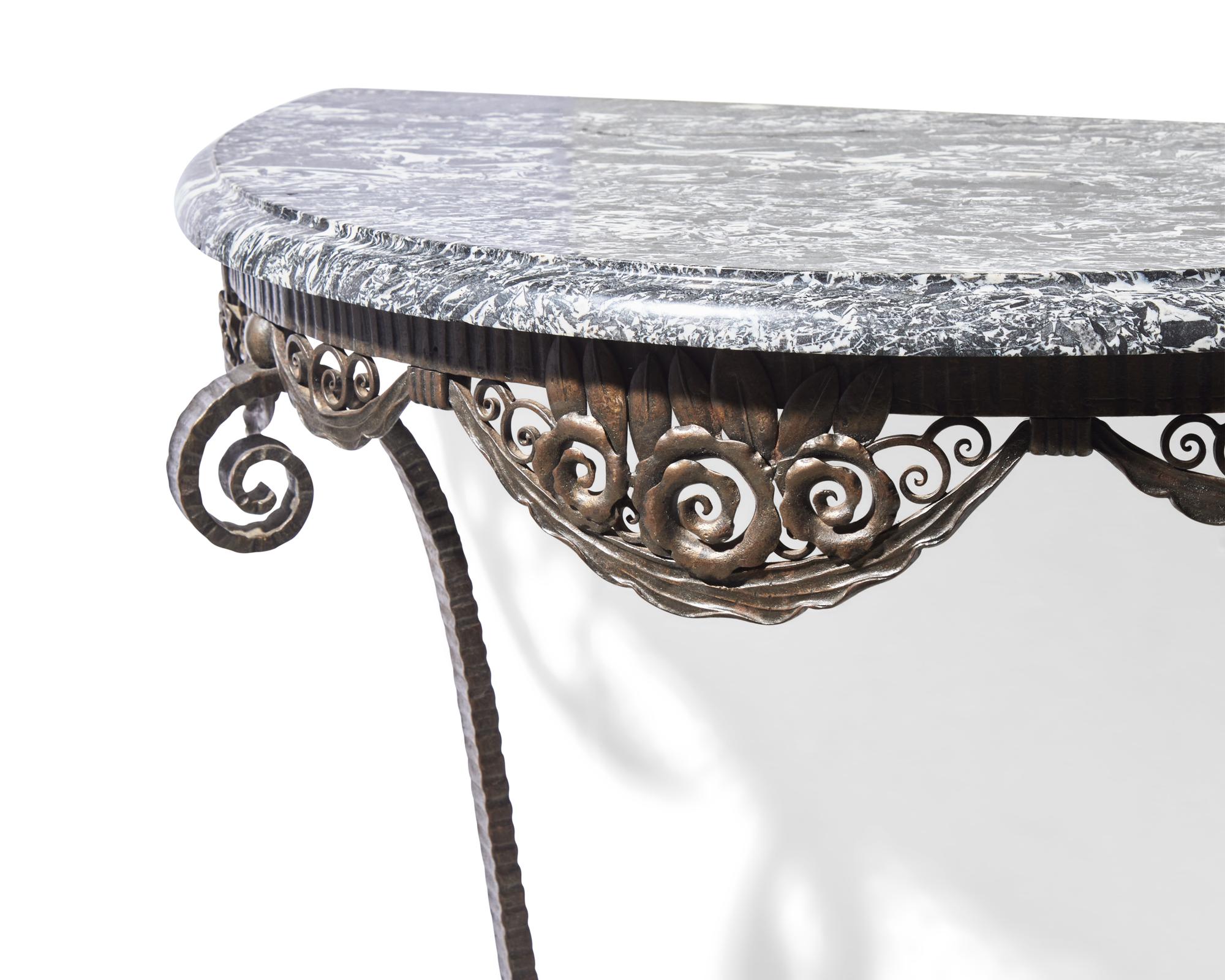 A French Art Deco iron console table with Grand antique marble top, circa 1930