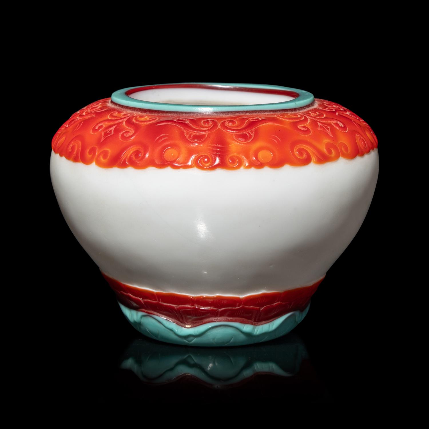 A Chinese Turquoise and Ruby Overlay White Glass Water Pot, Qianlong Mark and Period 清乾隆 白地套彩料饕餮蓮紋水盂