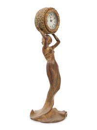 A New Haven Clock Co. Gilt Metal Figural Table Clock