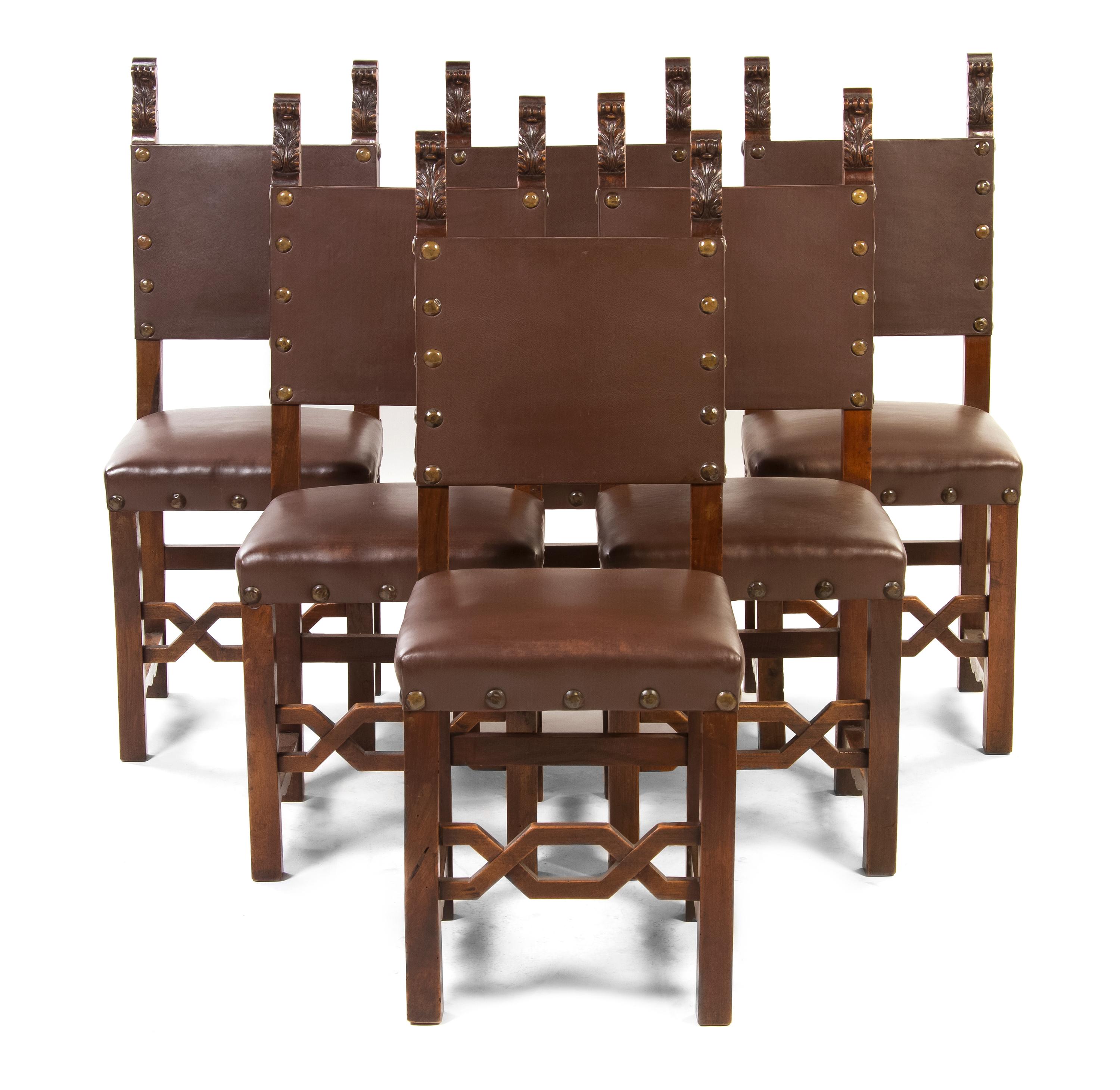 A Set of Twelve Italian Renaissance Revival Oak Side Chairs, Height 43 inches.
