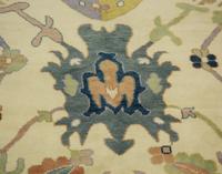 An Oushak Wool Rug