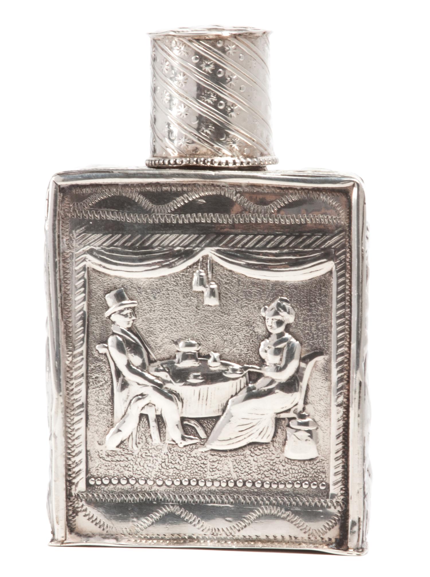 A German Silver Allegorical Bottle with Lid, , of rectangular form with chased figural decoration, inscribed on bottom.