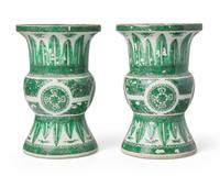 A pair of Chinese Export porcelain green "Fitzhugh" gu-form vases, circa 1800