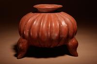 A Colima Terracotta Gadrooned Tripod Vessel