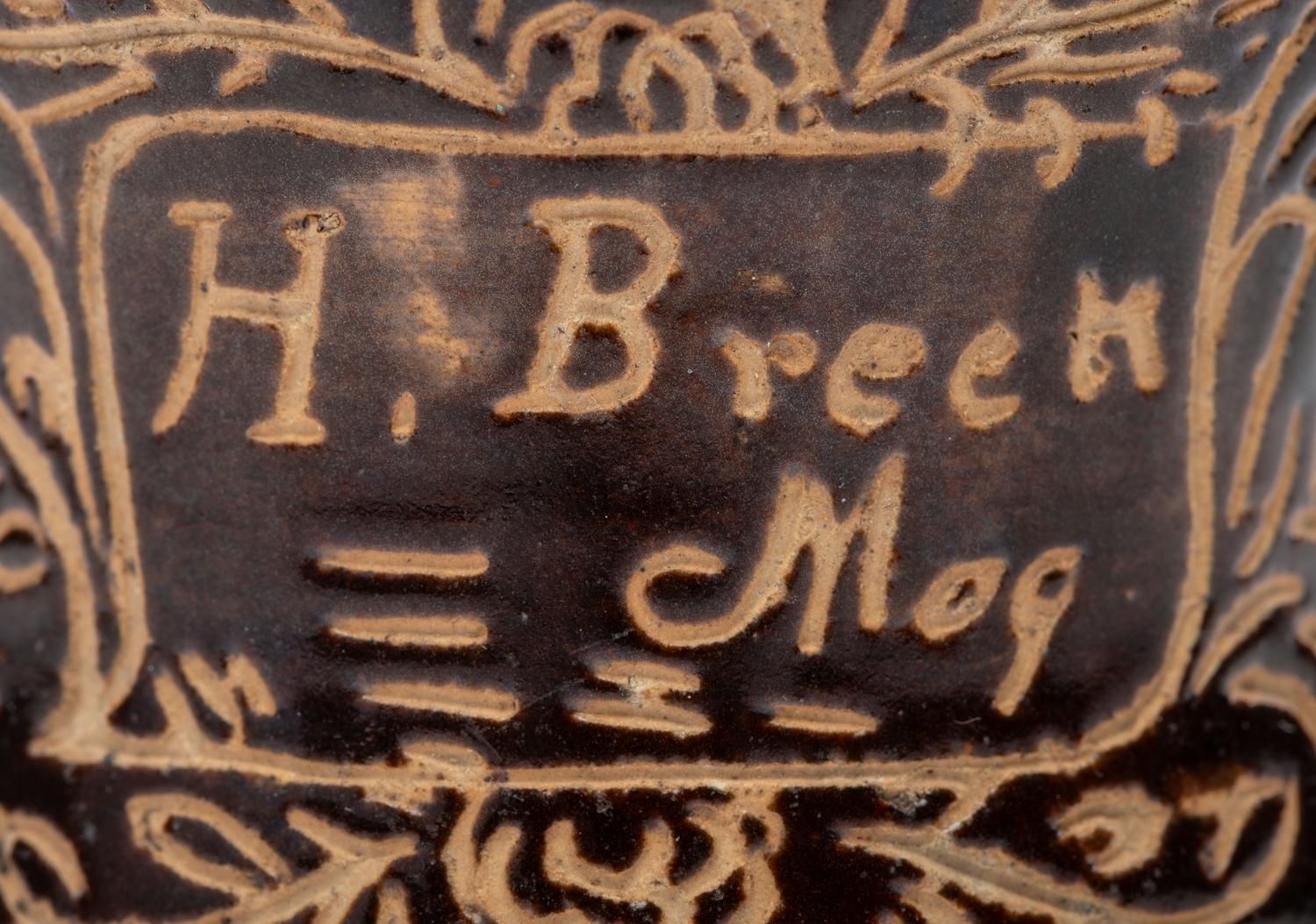A Slip-Glazed and Incised Mug