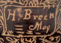 A Slip-Glazed and Incised Mug