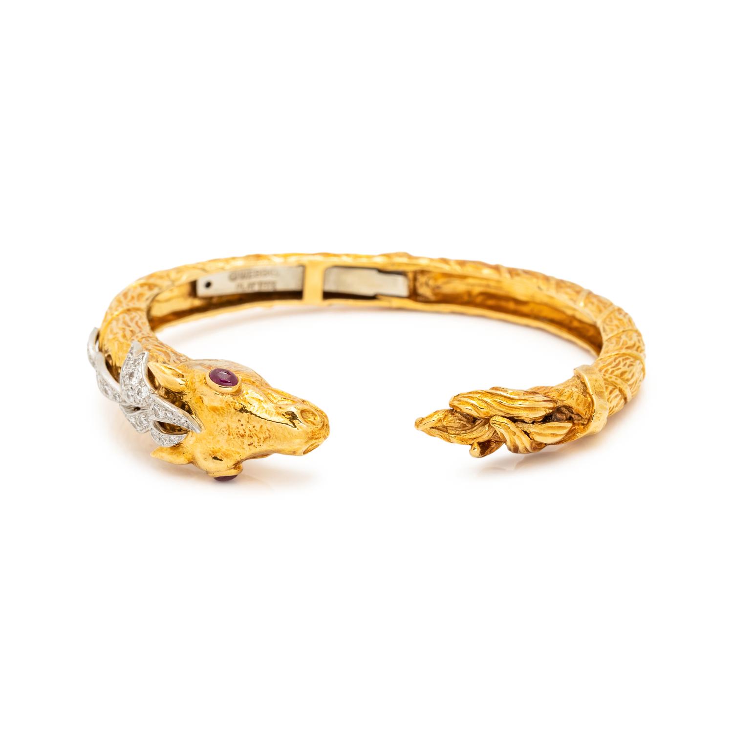 DAVID WEBB, YELLOW GOLD, DIAMOND AND RUBY HORSE CUFF BRACELET