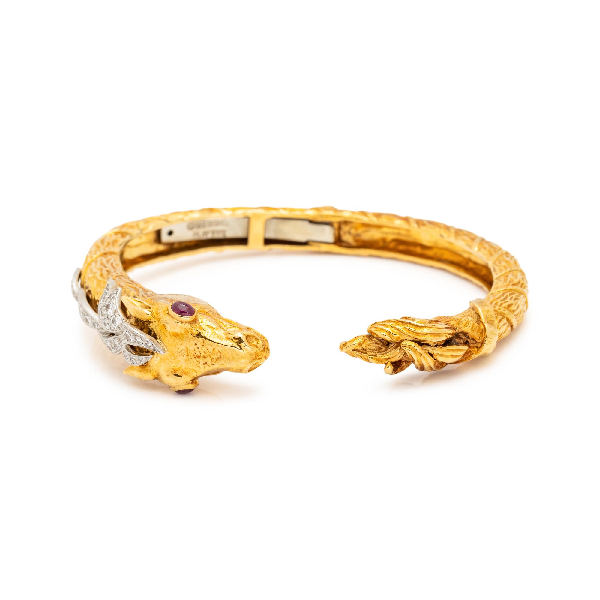 DAVID WEBB, YELLOW GOLD, DIAMOND AND RUBY HORSE CUFF BRACELET