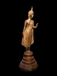 A Thai Gilt Bronze Figure of Standing Buddha