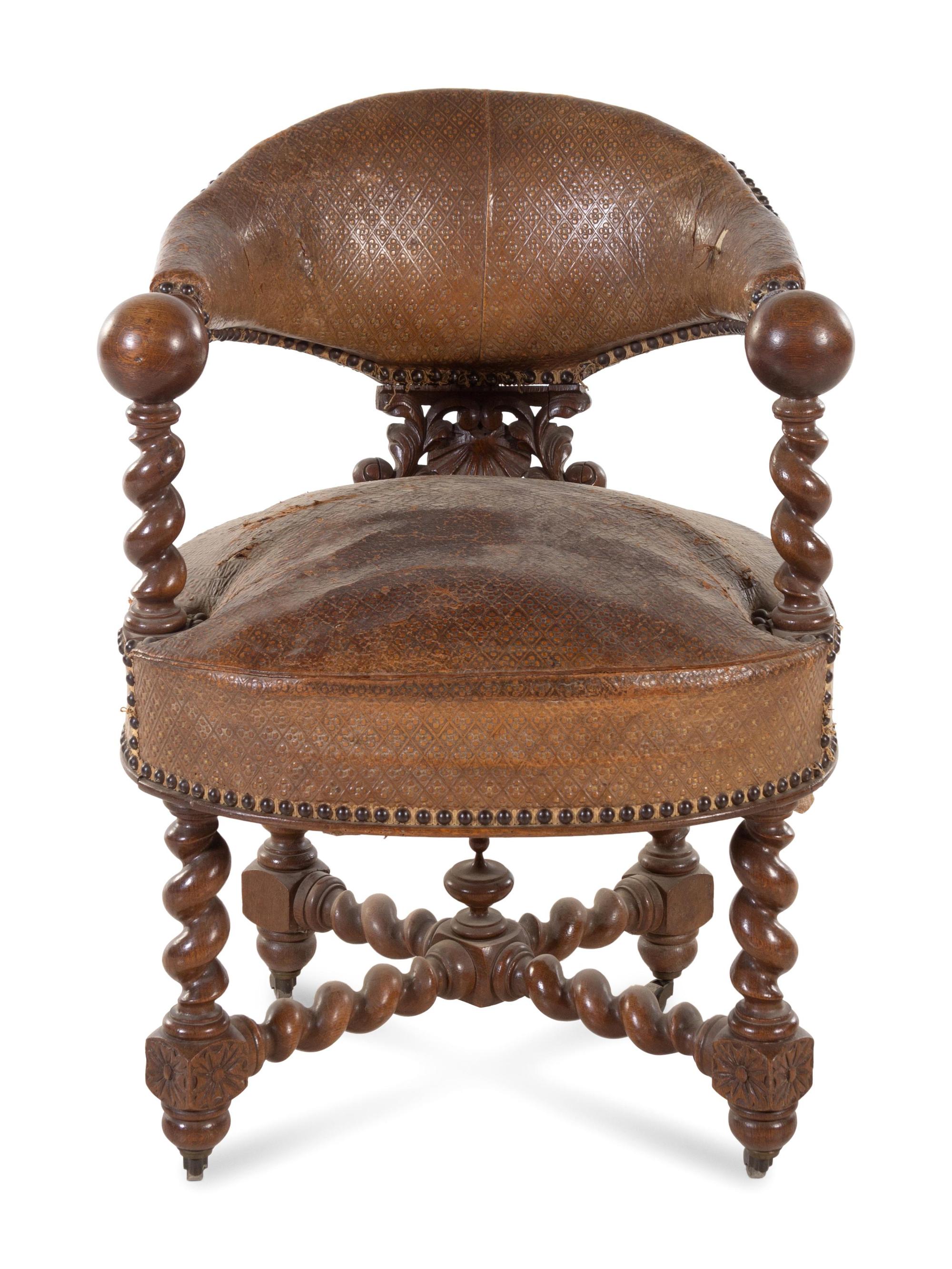 A Continental Renaissance Revival Carved Walnut Armchair