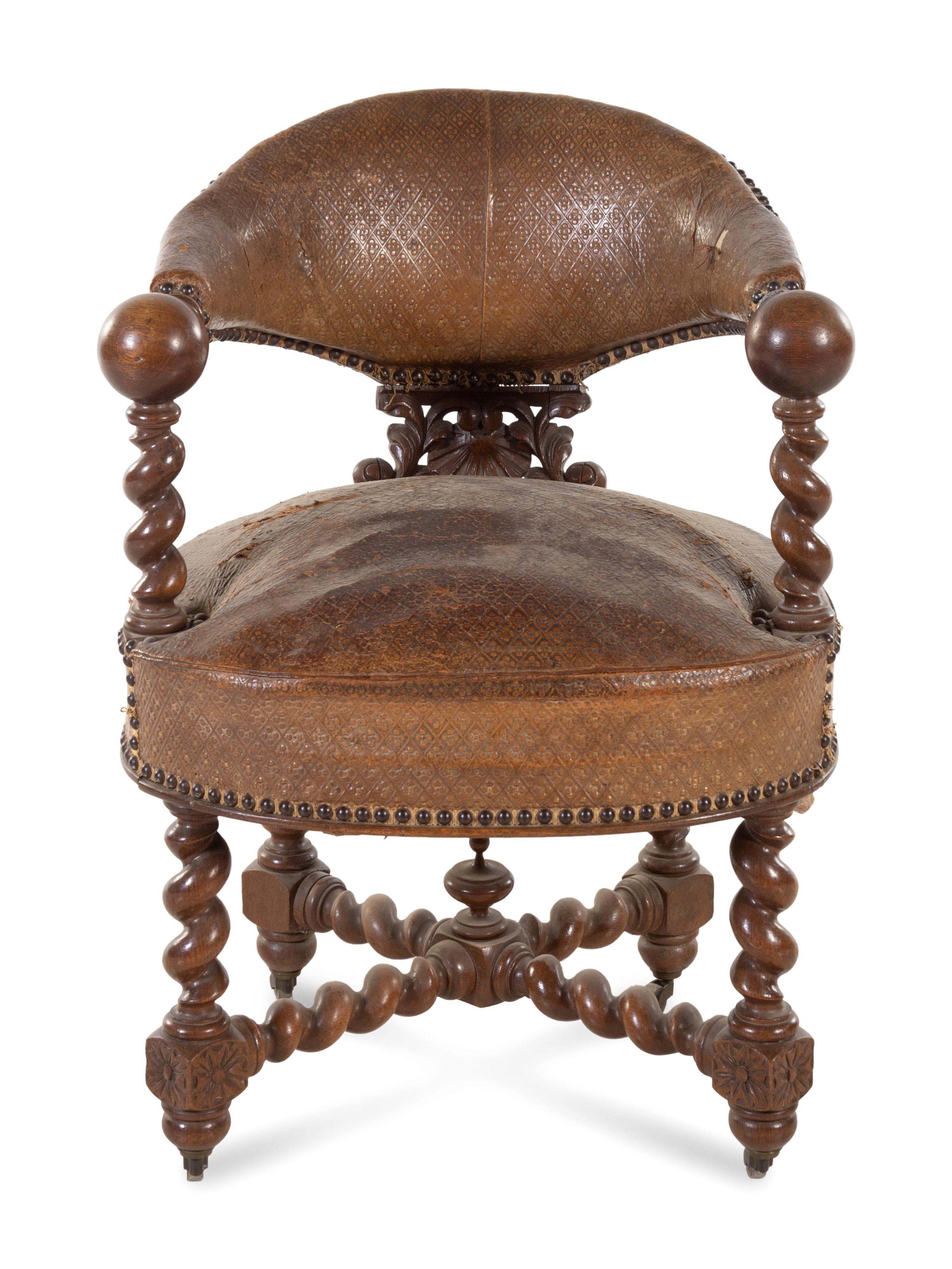 A Continental Renaissance Revival Carved Walnut Armchair