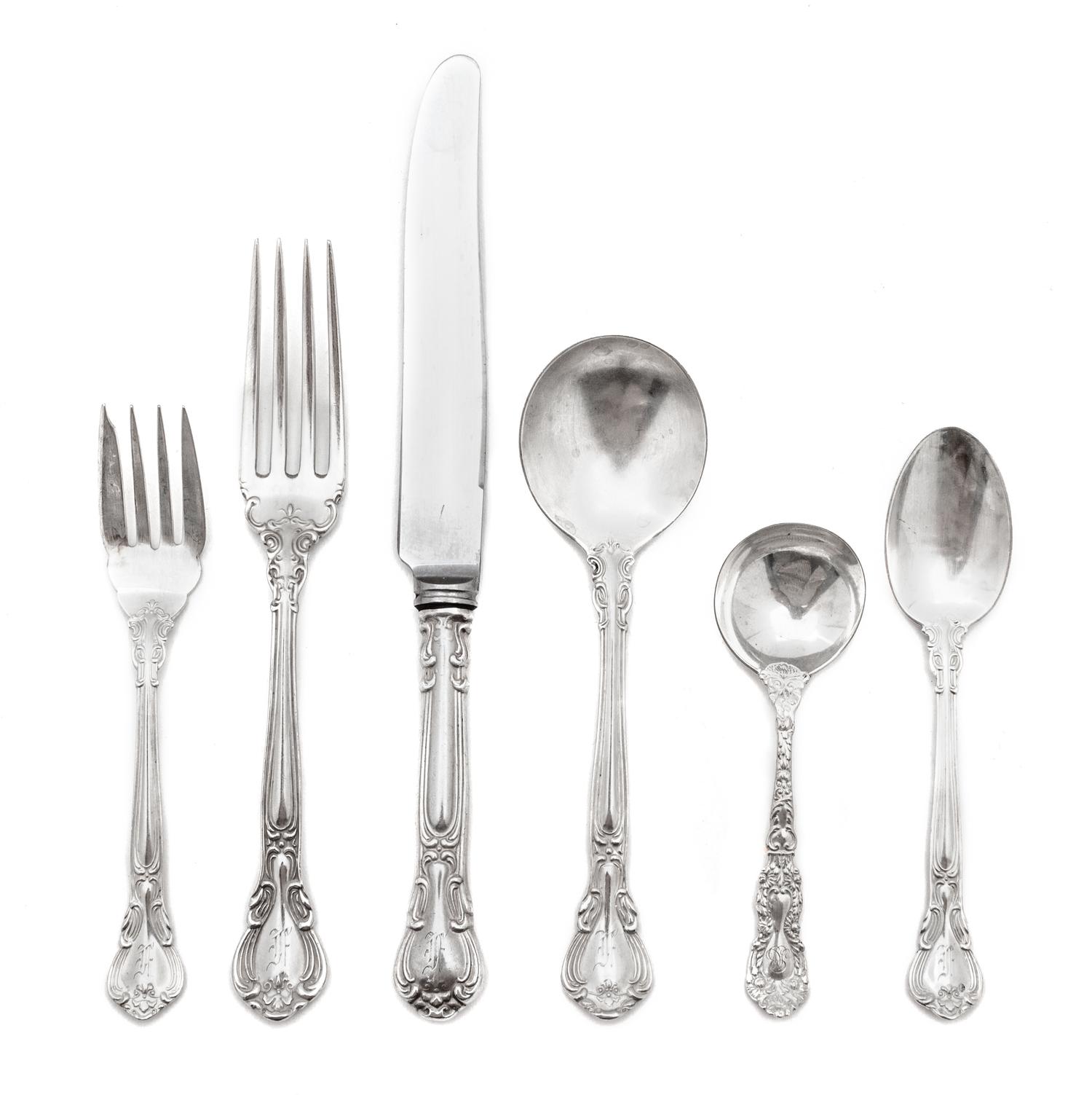A Canadian Silver Flatware Service, Henry Birks & Sons, Montreal, Canada, Chantilly Monogrammed pattern, comprising: 11 dinner knives 1