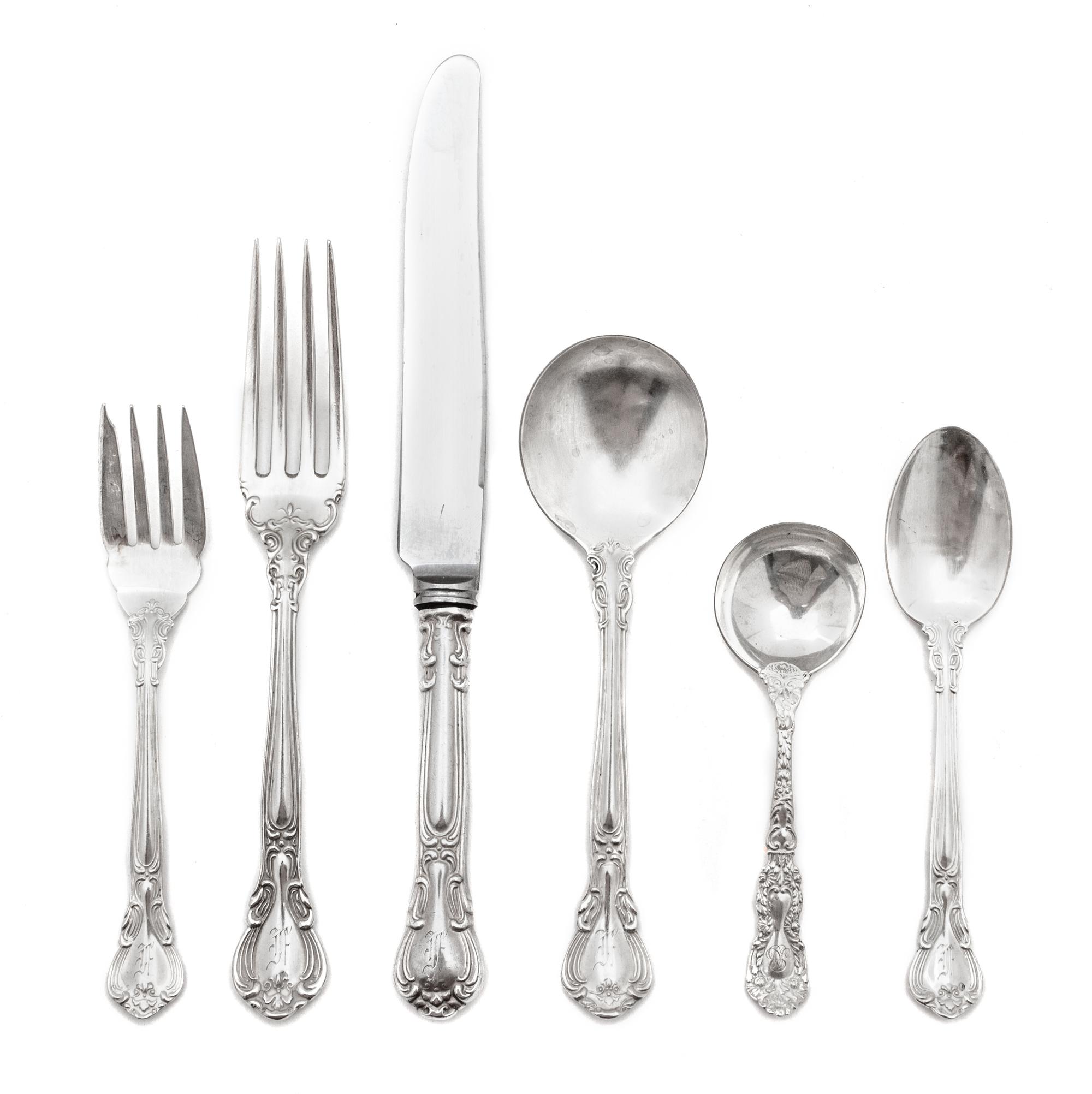 A Canadian Silver Flatware Service, Henry Birks & Sons, Montreal, Canada, Chantilly Monogrammed pattern, comprising: 11 dinner knives 1