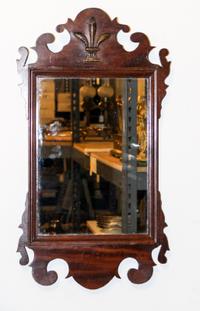 A Chippendale Style Mahogany Mirror Height 24 1/2 x width 13 1/2 inches. — 20TH CENTURY