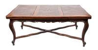 A French Provincial Dining Table Height 30 1/2 x width 70 3/4 x depth 43 inches.