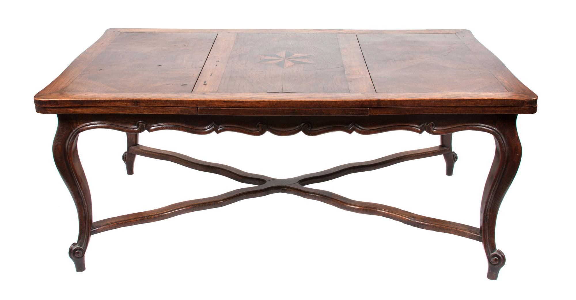 A French Provincial Dining Table Height 30 1/2 x width 70 3/4 x depth 43 inches.