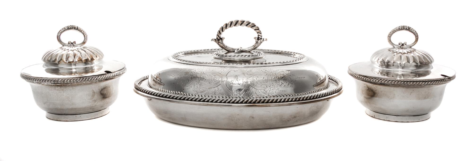 A Collection of Silver-Plate Serving Articles, 20th Century, comprising three trays, two covered sauce tureens and a covered entree.