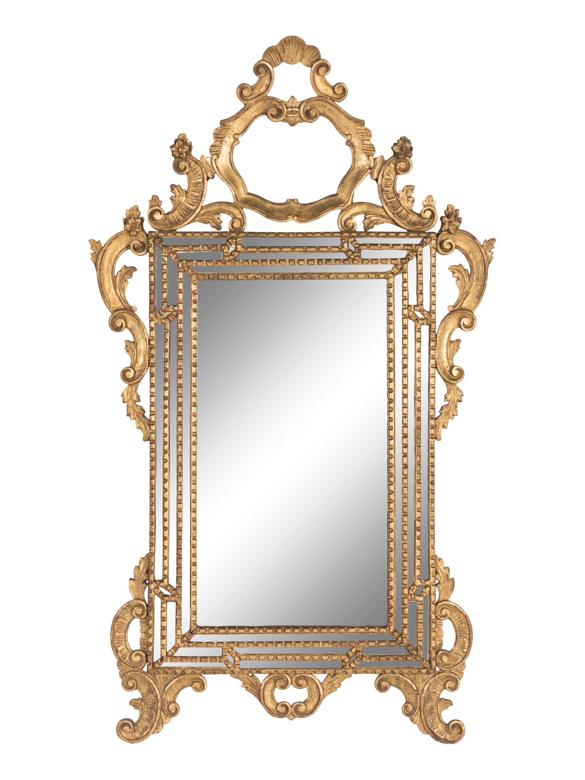 An Italian Baroque Style Giltwood Mirror