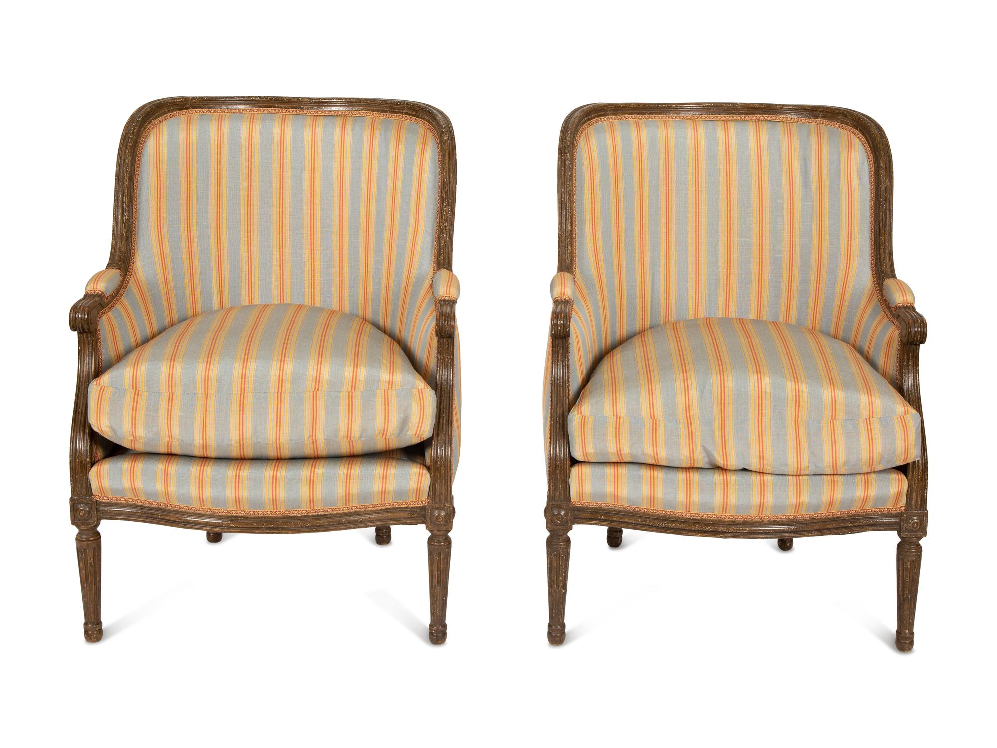 A Pair of Louis XVI Style Faux Finish Bergeres