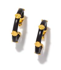 A Pair of Gianni Versace Black Leather Earclips, 4.25" diameter.