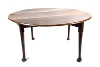 A Queen Anne Style Mahogany Drop-Leaf Table Height 29 x width 57 (leaves up) x depth 56 inches. — 19TH CENTURY