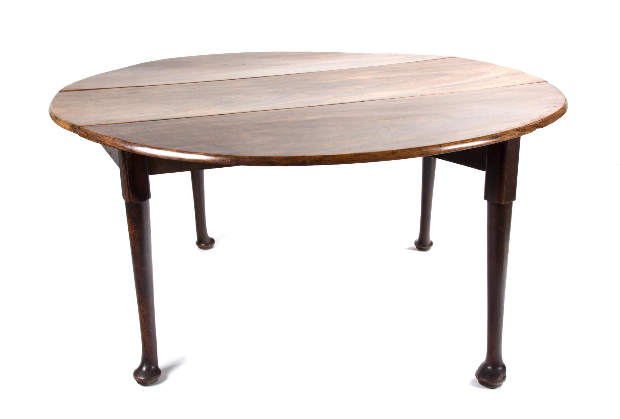 A Queen Anne Style Mahogany Drop-Leaf Table Height 29 x width 57 (leaves up) x depth 56 inches. — 19TH CENTURY
