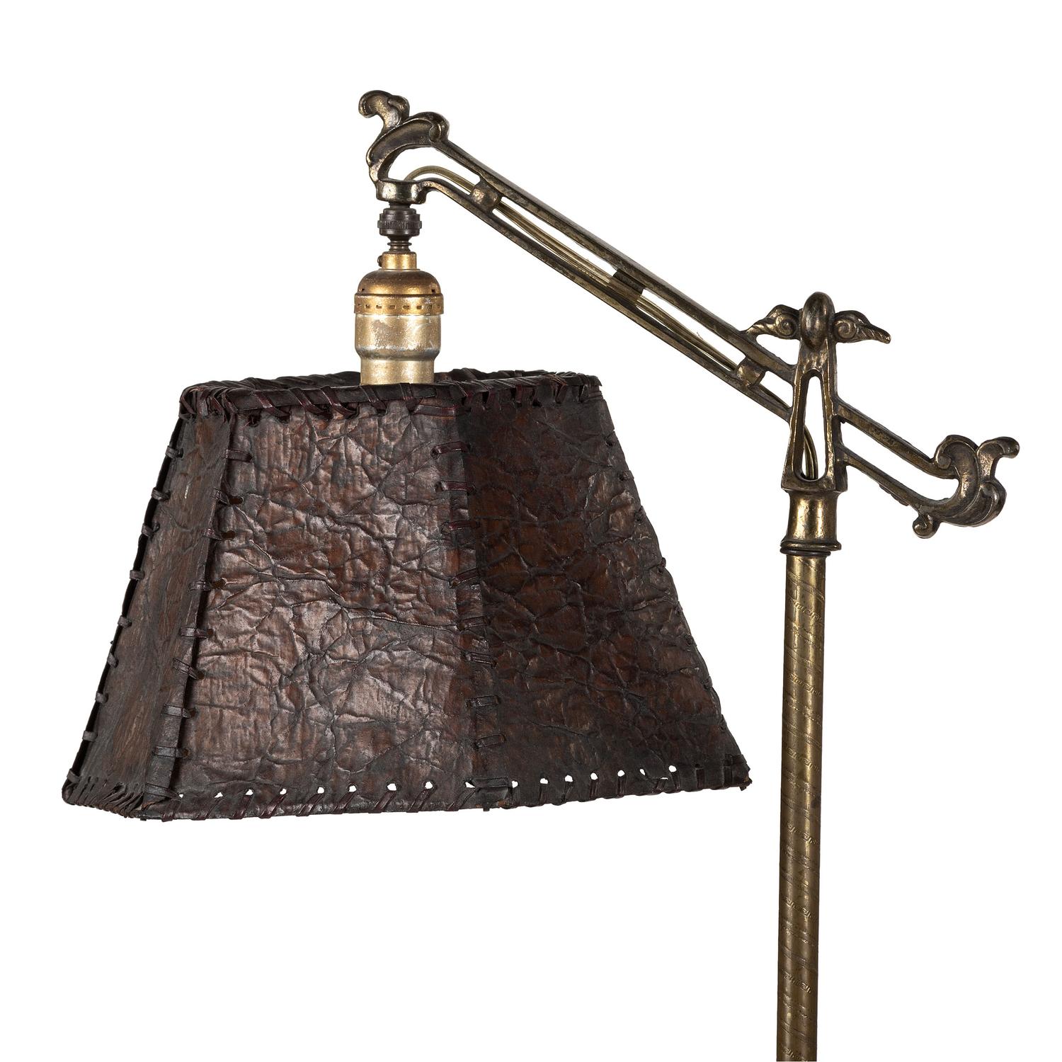 A Cast Metal Floor Lamp with a Leather Shade