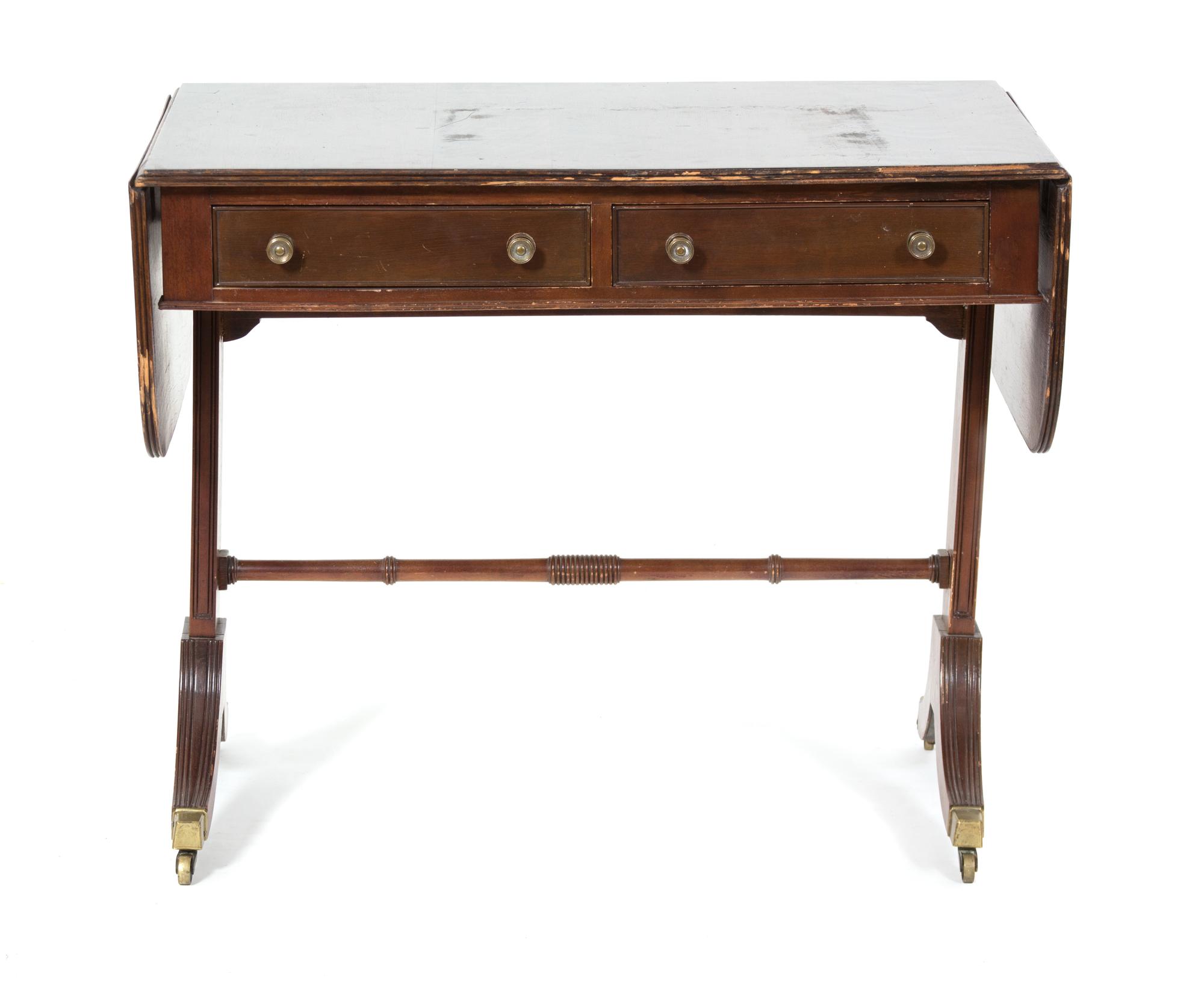 A Regency Style Mahogany Drop Leaf Sofa Table Height 29 1/2 x width 49 1/4 x depth 24 inches. — 19TH CENTURY