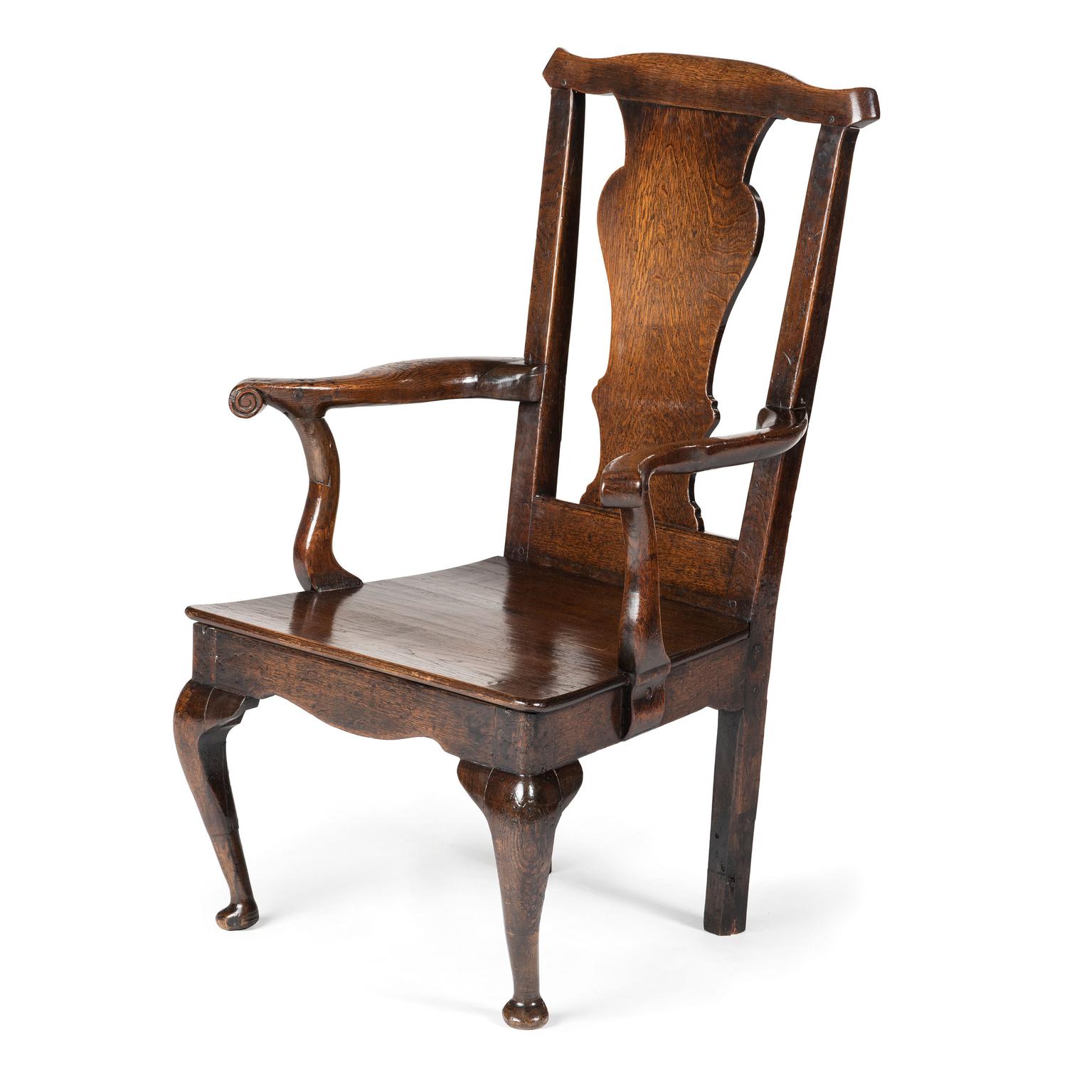 A Queen Anne Volute Carved Oak Open Armchair