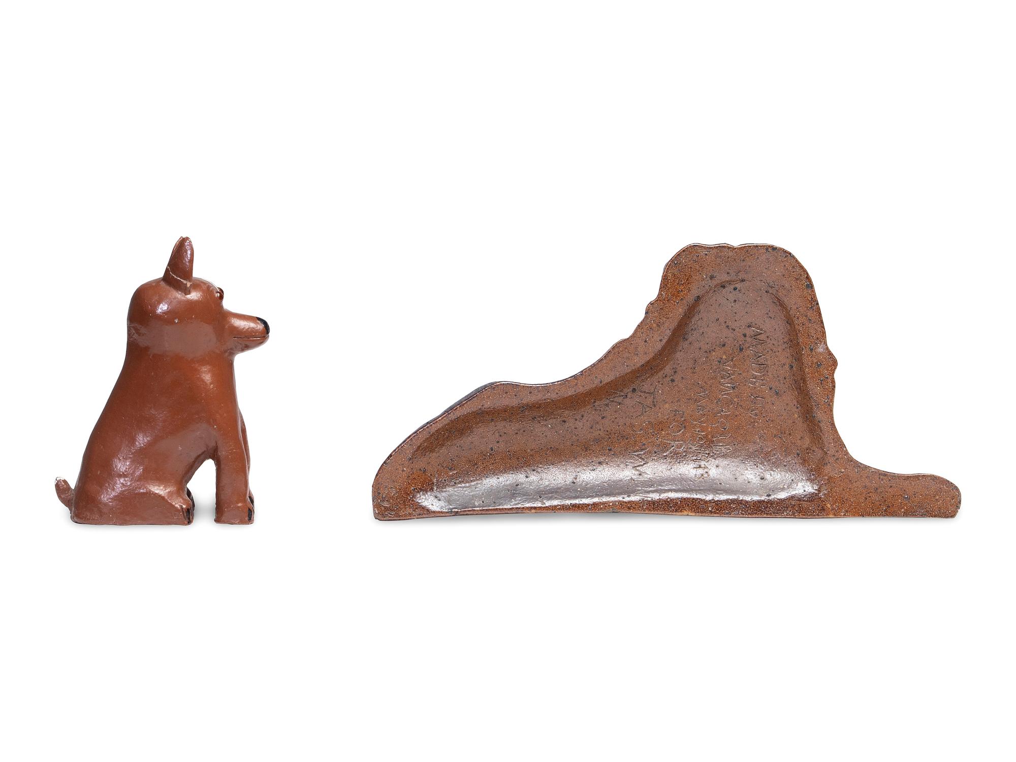 A Glazed Sewer Tile Recumbent Lion Doorstop