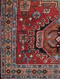 Five Wool Rugs