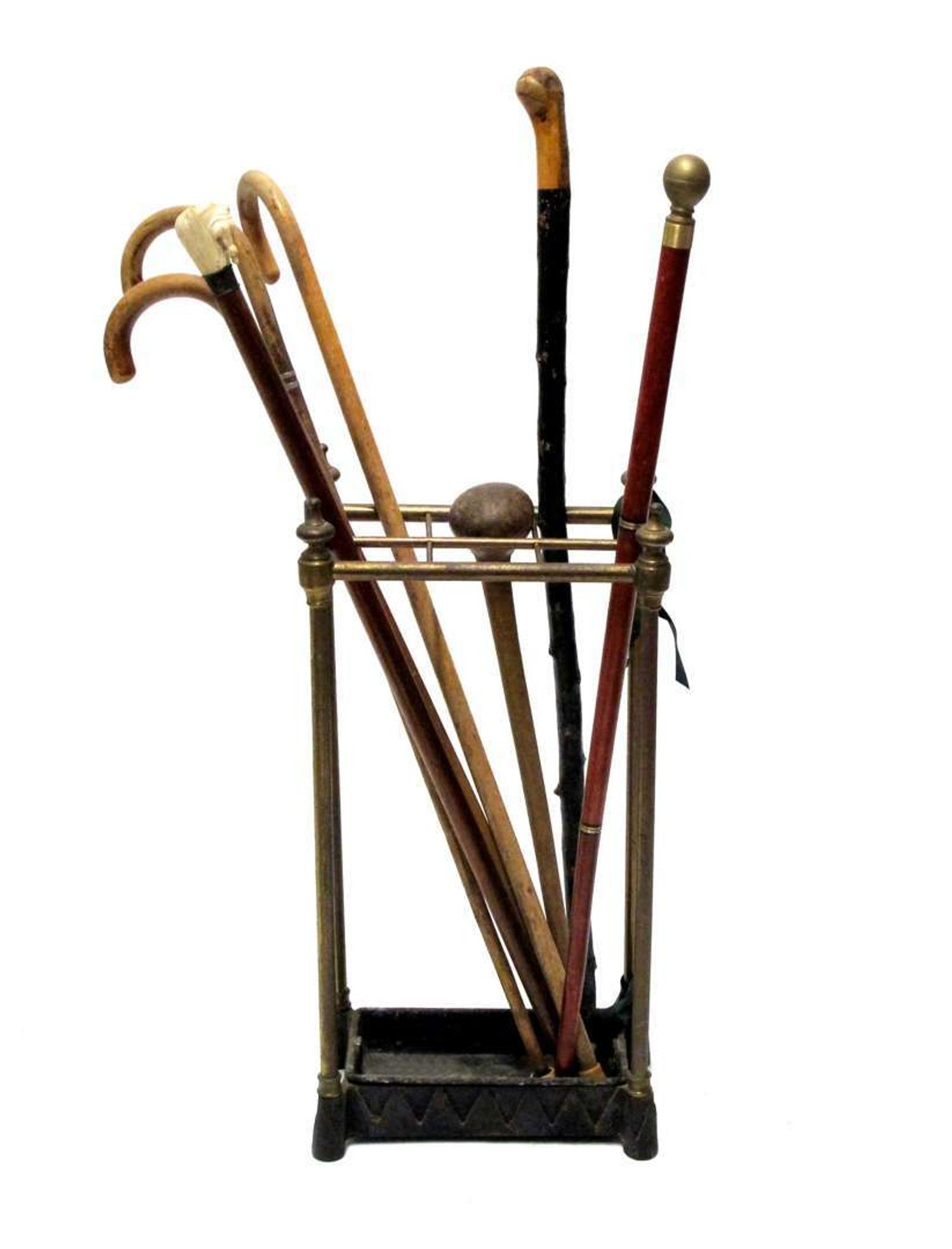 Brass and iron umbrella stand with canes 19th/20th century