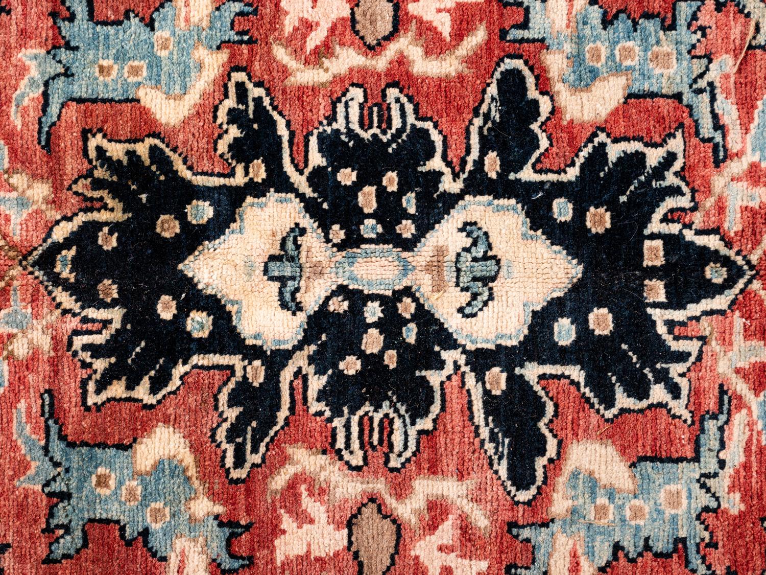 A Heriz Wool Rug