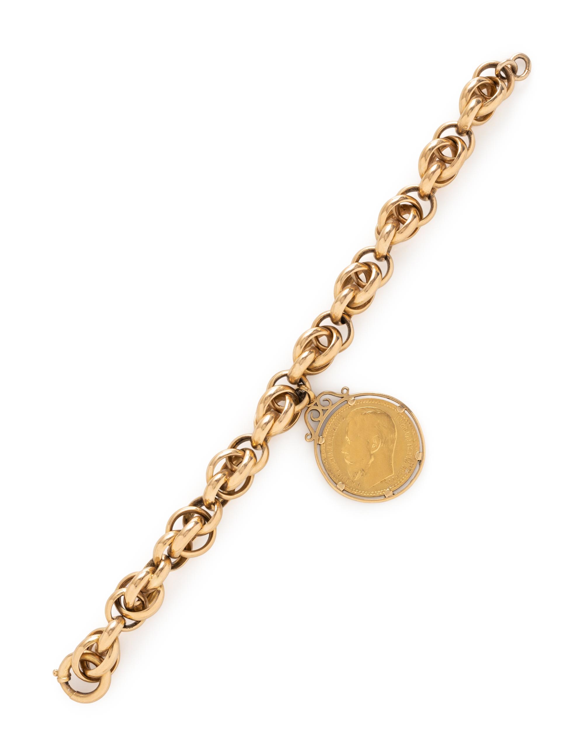 YELLOW GOLD BRACELET WITH COIN CHARM